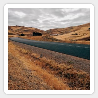 Road Through Barren Countryside Sticker